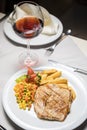 Grilled Pork loin, side dish and Wine Royalty Free Stock Photo